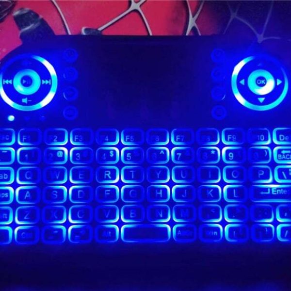 Backlit mini keyboard and touchpad
